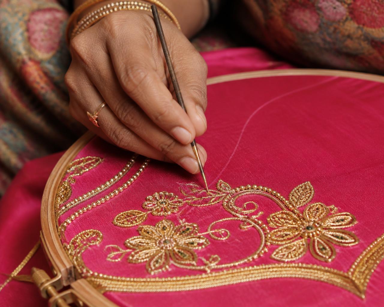 Aari hand embroidery with gold thread on pink silk